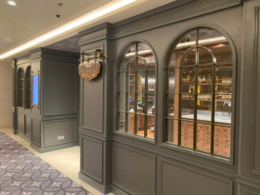 Interior of Disney Wish's Hook's Barbery's
