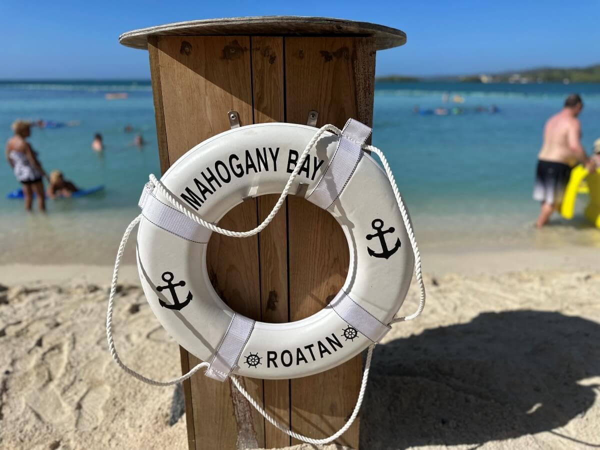 A white life preserver ring labeled
