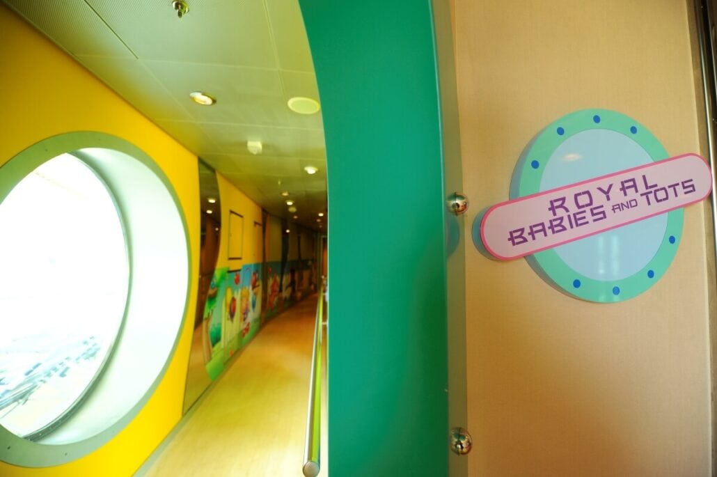 A hallway with a sign that says